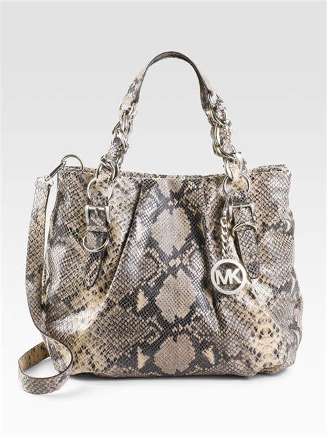 michael kors cheap assessories for totes|michael kors embossed tote.